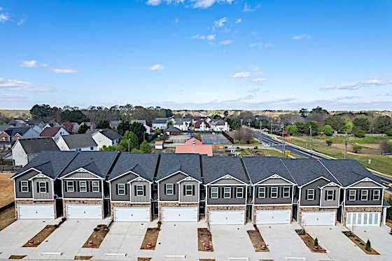 New Homes in Hampton, Georgia built by Dream Finders Homes in the New Home Community of The Enclave Townhomes!