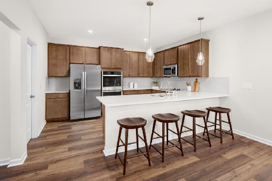 New Homes in Jackson, Georgia built by Dream Finders Homes in the New Home Community of The Woodlands Preserve!