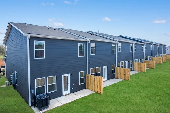 New Homes in Hampton, Georgia built by Dream Finders Homes in the New Home Community of The Enclave Townhomes!